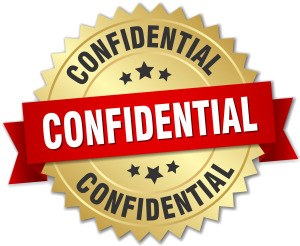 badge avec ecrit Confidentiel pour montrer que le poste est pour une compagnie confidentielle